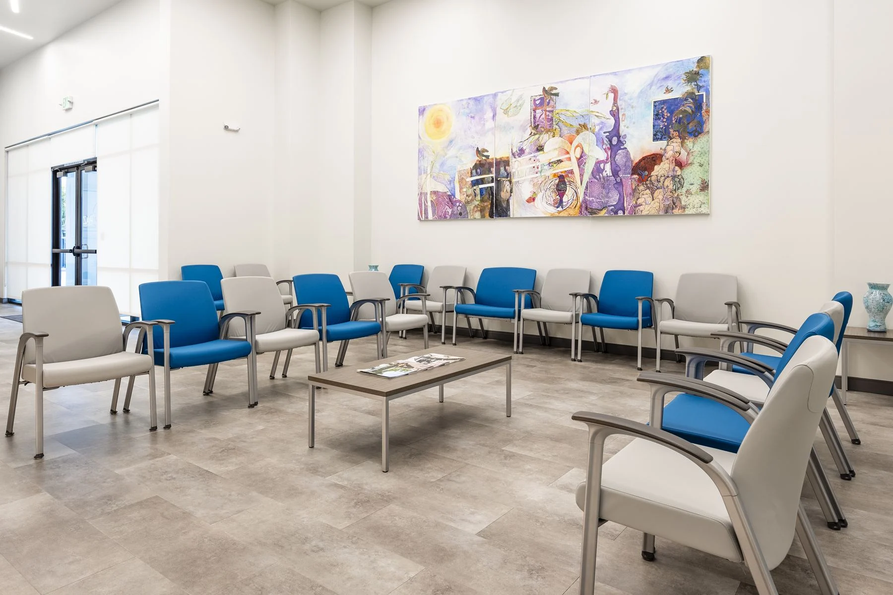 The Fresno waiting room with a large painting
