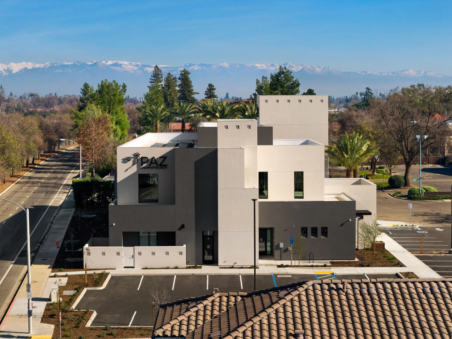 The Visalia office with the snow-capped Sierra behind it